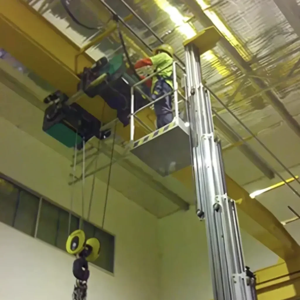 Crane maintenance by Jenmon Technician using certified manlift