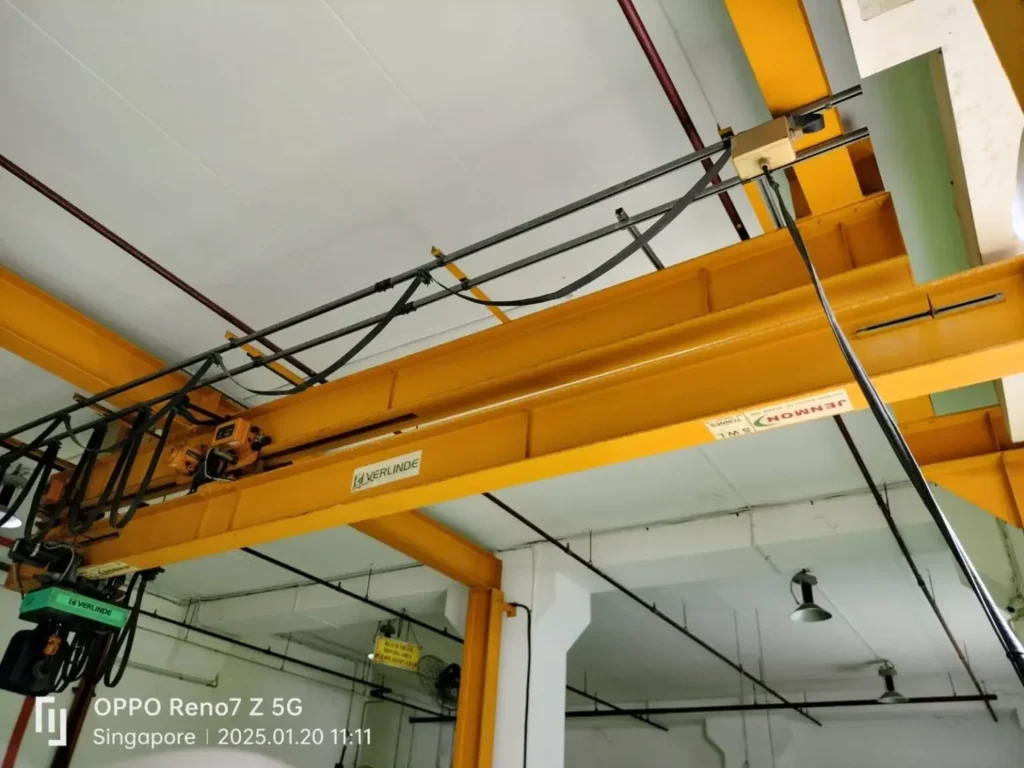 Jenmon retractable monorail crane using Verlinde hoist fully retracted indoor