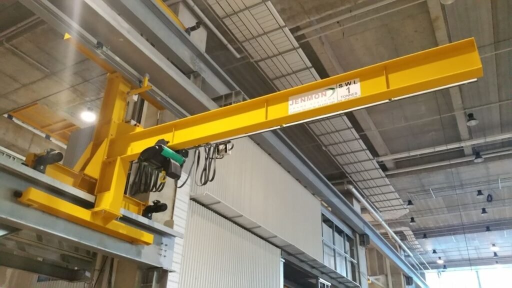 A close up view of a jib crane attached to a wall