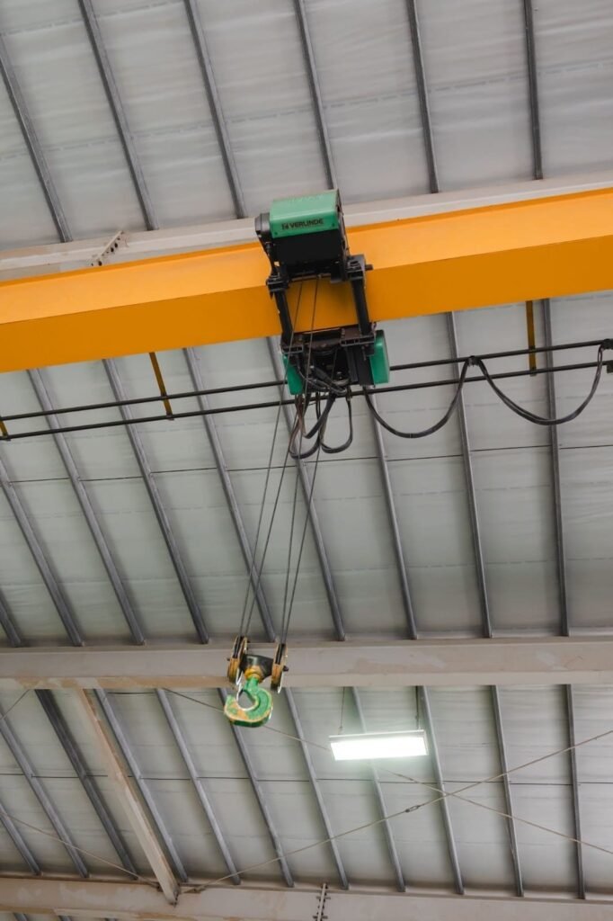 An image of a hoist attached to a crane