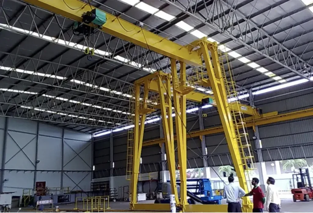A gantry crane inside a huge indoor facility