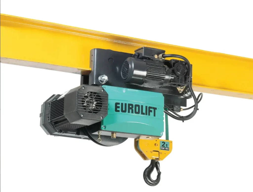 Industrial electric hoist mounted on a yellow overhead beam