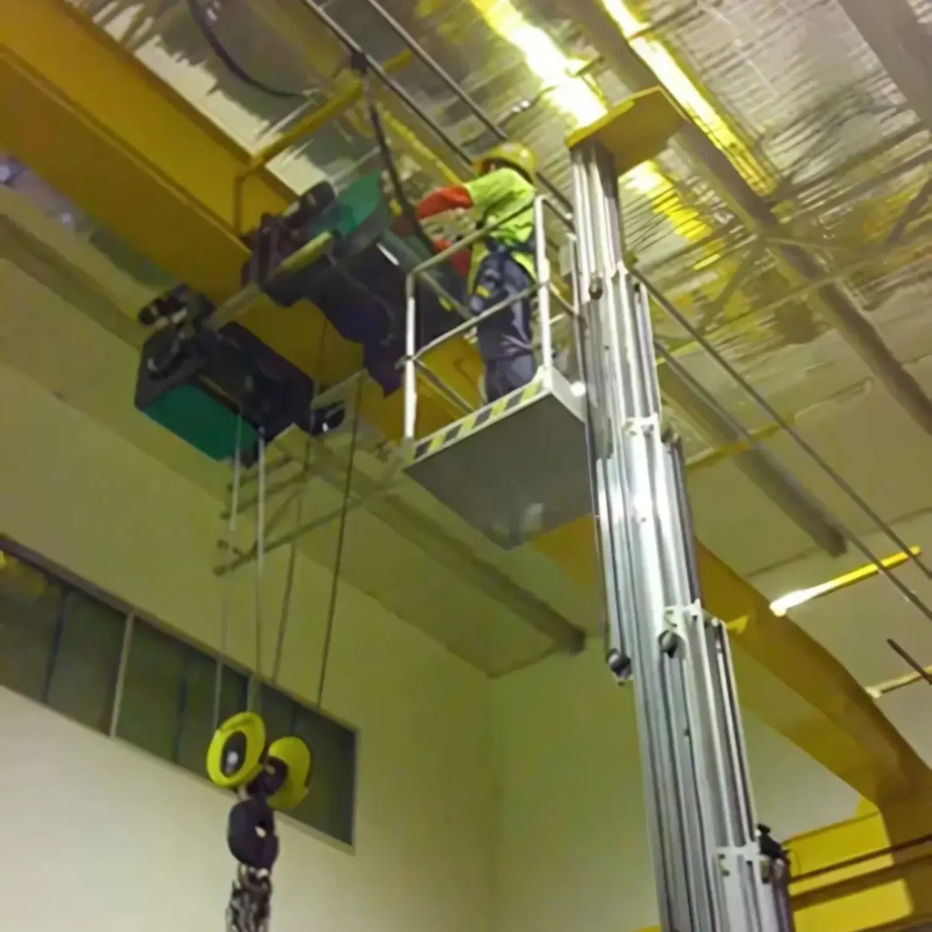 Jenmon professional preventive maintenance inspector is working on the hoist