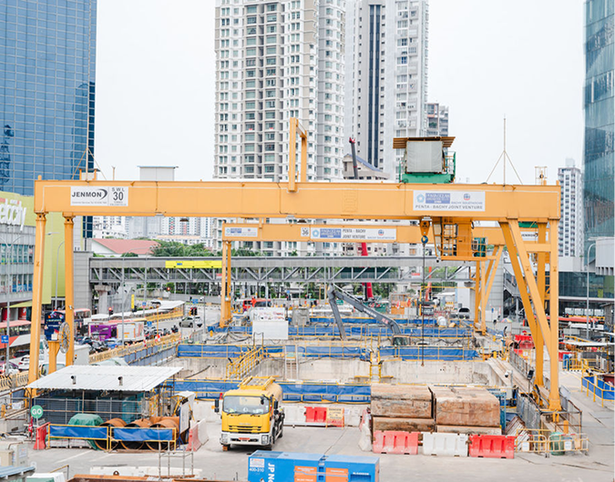 Jenmon overhead crane and excavator during load testing at a tunnel site